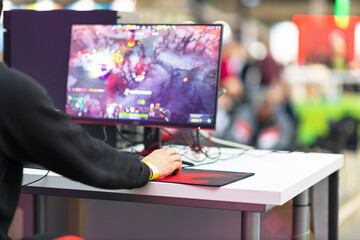 Gamer playing online computer video game. 
E-sport concept.