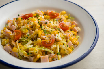 Turkey, corn, cabbage and mayonnaise salad. Traditional salad recipe for summer.