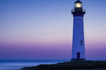 Naklejka premium Solitary Lighthouse at Twilight
