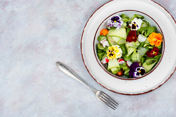 Vitamin vegetable salad with flowers.