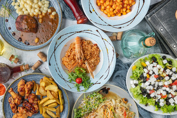 Full table of plates with stew photographed from above: A captivating view capturing the assortment...