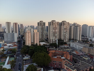Incredible sunset in the city of São Paulo, a megalopolis with an aerial image above the Tietê River.
