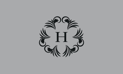 Elegant floral monogram design template for one or two letters such as H. Business sign, identity monogram for restaurant, boutique, hotel, heraldic, jewelry