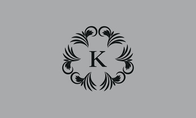 Elegant floral monogram design template for one or two letters such as K. Business sign, identity monogram for restaurant, boutique, hotel, heraldic, jewelry