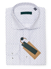 White folded polka dot shirt in dark blue color isolated on white background, top view