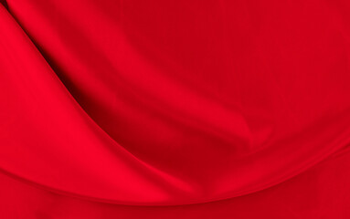 Black red satin dark fabric texture luxurious shiny that is abstract silk cloth background with...