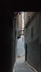 Narrow alley in the medina in Fes, Morocco