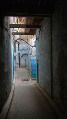 Narrow alley in the medina in Fes, Morocco