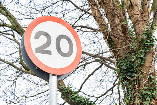 Road signs indicating the new 20 MPH speed limit in residential area's in Wales, UK
