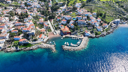 Aerial drone photo of small picturesque seaside village and harbour of Kaminia located near main village of Hydra island accessible by footpath, Saronic gulf, Greece