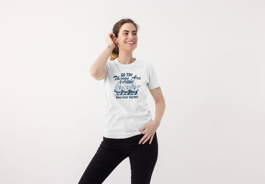 Mockup of woman wearing customizable t-shirt in studio