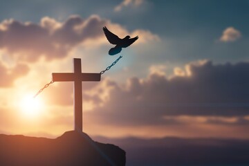 Silhouette of wooden Cross over sunset with flying bird