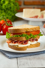 sandwich with ham and vegetables