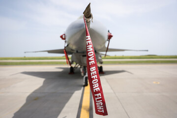 Remove before flight ribbon safety on a fighter jet
