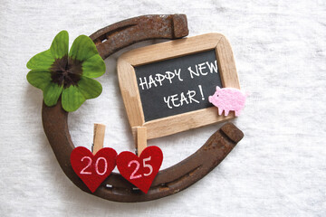 Happy New Year2025 Decoration with hearts horseshoe four leaf clover and number 2025