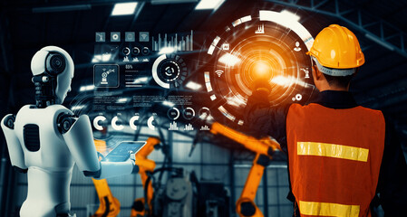 MLB Mechanized industry robot and human worker working together in future factory. Concept of...