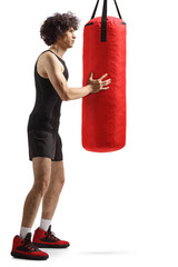 Young man holding a punching bag