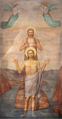 Fototapeta premium MILAN, ITALY - MARCH 7, 2024: The fresco of Baptism of Jesus in the main apse of church Chiesa di San Vito in Gianbellino by Antonio Martinotti (1957).