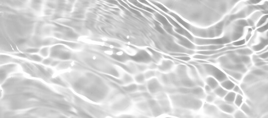 Sun light effect on transparent blurred white water shadow texture surface background. Ripple wave water texture on white background. Abstract banner background with copy space for summer products