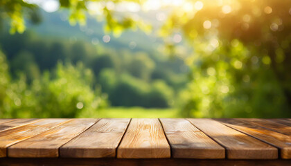 Empty wooden table. Mock up for product display. Green blurred nature on background.