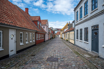 cobblestone street leading up to Hans Christian Andersen's house in Odense