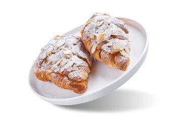 Almond croissants with sugar sprinkles on a white isolated background