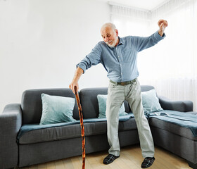 senior dance dancing vitality active healthy man walking cane stick fun retirement elderly happy...