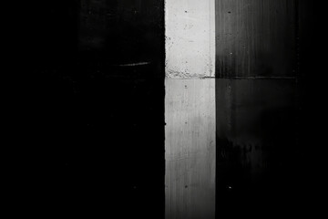 A black and white photo of a wall with a white line