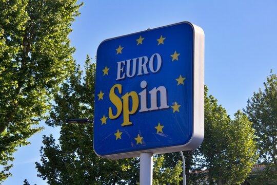 April 20th 2024 Florence, Italy. Sign of an Eurospin italian supermarket against the blue sky. It is an Italian company in the large-scale distribution of the discount channel