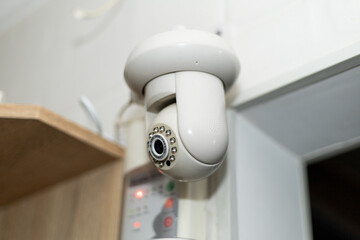 surveillance video camera on the wall in the apartment