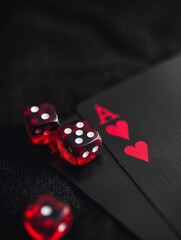 Red dice and ace card on laptop keyboard - Two red dice and a playing card with ace of hearts symbol situated on a laptop's black keyboard, highlighting online gambling