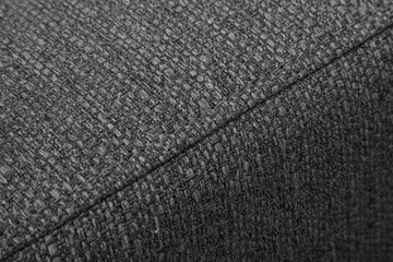 Textured grey furniture fabric with stitching