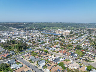 Aerial view of house with blue sky in suburb city in San Diego, California, USA.