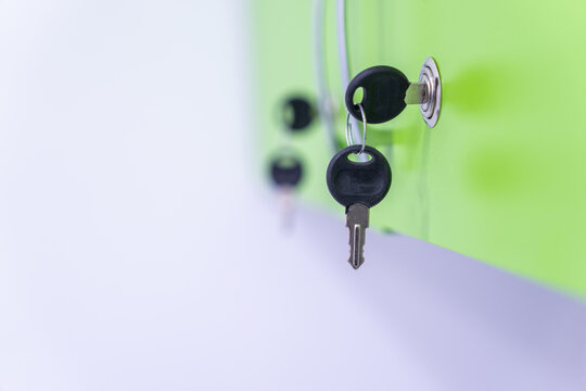 Green drawer opening key in focus