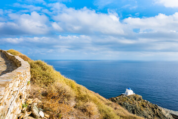 View of small Greek chapel church against blue sea in Kastro village, Sifnos island, Greece - 792073027