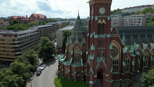 Aerial view of Oscar Fredrik Church - Gothenburg city in Sweden. Olivedal district landmark - Oscar Fredriks Kyrka (Oscar Fredrik Church). Neo Gothic architecture style. Drone recording. Cityscape