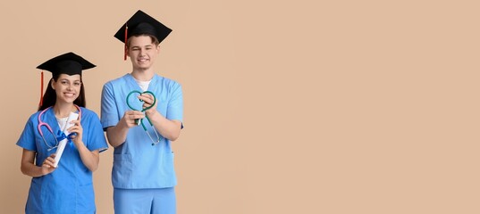 Medical graduating students on beige background with space for text