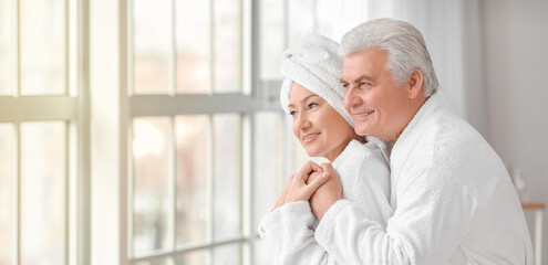 Morning of mature couple in bathroom