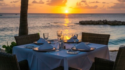 A lovely table set for sunset dining with feet-in-the-water ocean front views. Taken In Aruba.

