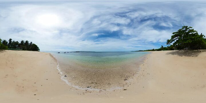 Sandy beach with transparent sea water and waves in Santa Fe, Romblon. Tablas Island. Philippines. VR 360.