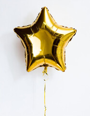 Gold star balloon for party and celebration on white background, festival, anniversary, new year concept