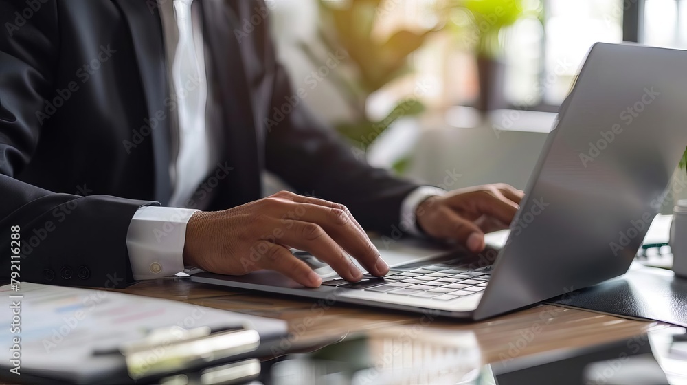 Poster businessman downloading files or installing software on laptop cloud storage and cyber security conc