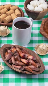 Typical brazilian june festival food over plaid fabric. Festa junina
