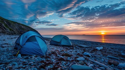 Blue Tents on seashore at sunset, Cape Breton Island, Canada.

