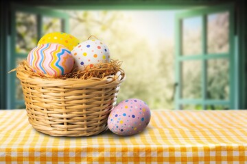 Easter colored eggs on window background