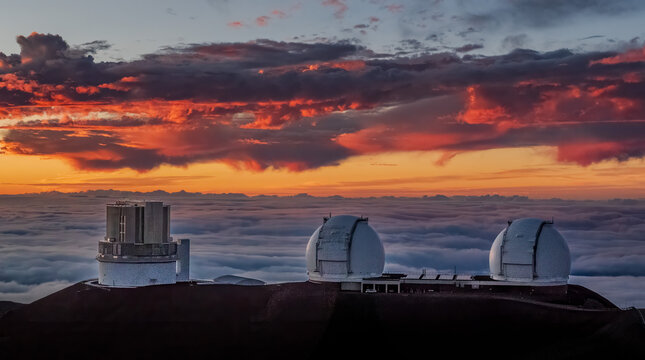 Sunset on Mauna Kea summit with observatories
