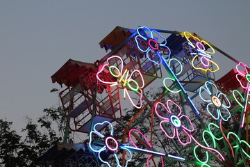 ferris wheel with of colorful lights