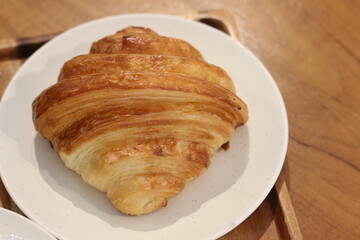 croissant on a plate at the cafe