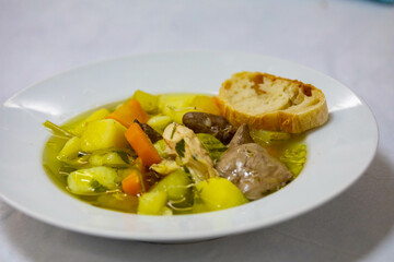 Healthy soup with chicken, vegetables .