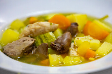 Healthy soup with chicken, vegetables .